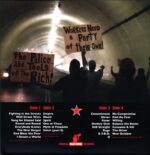 Man Lifting Banner-The Revolution Continues-LP Vinyl
